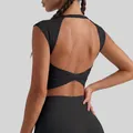 Professional black sports bra featuring a hollow out twist back design for women's fitness - S / Tops / Starry Black