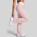 Pink high-waisted flared yoga pants with fold-over waistband and drawstring detail - S / Bottoms / Shell Pink
