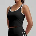 Sujetador deportivo negro con ribete blanco en contraste y copas fijas para yoga de alto impacto - S / Tops / Negro Estrellado