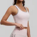 Sujetador deportivo rosa con ribete gris y copas fijas ideal para yoga o correr. - S / Tops / Rosa Niebla