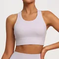 Nude-feeling racerback sports bra in light purple for high-impact yoga and fitness training - Purple