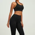 Two-piece black fitness yoga set featuring shockproof sports bra and slim fit leggings - S / Top And Bottom / Black