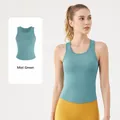 Ademende sporttanktop met hoge stretch en ingebouwde pads in de kleur mistgroen - Mistgroen