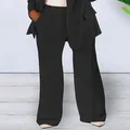 Detailed view of women's professional black slim fit blazer and wide-leg suit trousers set - S / Bottoms / Black