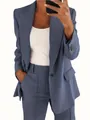 Elegante conjunto de traje azul de dos piezas para mujer con blazer de corte entallado. - S / Tops / Azul