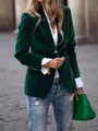 Detail of a dark green velvet slim-fit blazer styled with a white shirt and ripped jeans. - S / Tops / Green