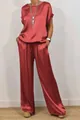Elegant brick red satin two-piece set with loose top and wide-leg trousers detail. - Red