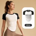 Damen Yoga-Sportoberteil in Weiß mit Raglanärmeln, Taillenfalte und enger Passform - S / Oberteile / Weiß