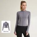 Slim-fit grey zip-up yoga jacket with thumb holes and ergonomic stitching for women - S / Tops / Sea Rock Grey