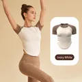 Schlank geschnittenes hochelastisches elfenbeinweißes Yoga-Oberteil mit Raffung - S / Oberteile / Elfenbein