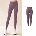 Naadloze yoga legging met hoge taille in lila gemaakt van ademende en elastische stof - S / Bottoms / Sering