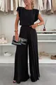 Detailed view of women's black two-piece set with sleeveless top and pleated wide-leg pants - S / Top And Bottom / Black