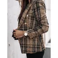 Close-up detail of a classic brown tweed double-breasted blazer with ornate gold buttons - S / Tops / Brown
