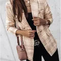 Detailed close-up of a women's elegant plaid double-breasted blazer with gold tone buttons - S / Tops / Khaki