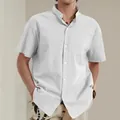 Detail shot of a men's white cotton linen short sleeve shirt with a stylish stand collar - M / Tops / White