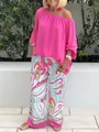 Outdoor shot of hot pink off-the-shoulder top and paisley wide-leg pants set - Pink