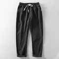 Classic men's loose breathable linen blend pants with adjustable drawstring waist in black - XL (110-125 Jin) / Bottoms / Black