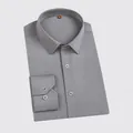 Classic grey long-sleeved business dress shirt for men in folded presentation - Gray
