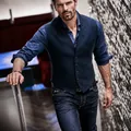 Detail view of a men's stylish blue slim-fit single-breasted waistcoat for casual wear - S / Tops / Dark Blue
