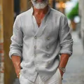 Close-up view of a men's gray cotton linen shirt featuring double-breasted stand collar - S / Tops / Light Gray