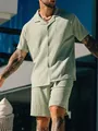 Close-up of men's sage green textured summer set featuring a button-down shirt and shorts - S / Top And Bottom / Green