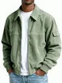 Close-up of a men's green corduroy jacket with a silver metal zipper and lapels. - S / Tops / Light Green
