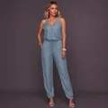 Stylish sky blue sleeveless denim jumpsuit featuring a drawstring waist and zipper front detail - XS / Top And Bottom / Sky Blue