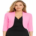 Close-up view of a stylish vibrant pink cropped bolero shrug cardigan for women. - Pink