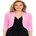 Close-up view of a stylish vibrant pink cropped bolero shrug cardigan for women. - Pink