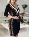 Detailed view of deep V-neck bodycon dress with leopard print and patchwork design. - S / Dresses / Leopard Print