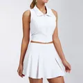 Front view of white sleeveless zip-up polo top and pleated tennis skirt set - S / Top And Bottom / Snow White