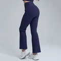 Women's high-waisted navy blue flared yoga pants featuring butt-lifting effect and slim fit - S / Bottoms / Navy Blue