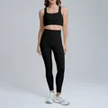 Two-piece black yoga set with sports bra and high-waisted leggings - S / Top And Bottom / Sports Bra + Leggings / Black