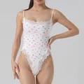 Elegant white heart print bodysuit with delicate lace trim and adjustable spaghetti straps - XS / Tops / T-Back White Heart Print