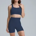 Navy blue two-piece women's yoga set with sports bra and high-waist biker shorts - S / Top And Bottom / Bra + Shorts / Navy Blue