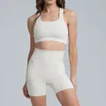 Women's cream white yoga set with high waist biker shorts and supportive sports bra - S / Top And Bottom / Bra + Shorts / Light Ivory