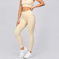 High-waisted seamless ribbed yoga leggings in beige color for women's gym fitness - S / Bottoms / Beige