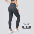 Pantalon de yoga sans couture à taille haute effet push-up fessier en gris foncé - S / Bas / Gris