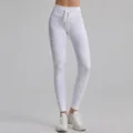 Premium white high-waisted ribbed yoga pants with an adjustable drawstring waist - S / Bottoms / White