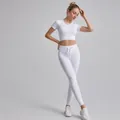 Two-piece white ribbed yoga set with short sleeve crop top and drawstring leggings - S / Top And Bottom / Short Sleeve + Leggings / White