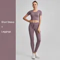 Mauve ribbed two-piece yoga set featuring a short sleeve crop top and high waist leggings - S / Top And Bottom / Short Sleeve + Leggings / Dusty Pink