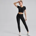 Women's ribbed yoga set in black with short sleeve crop top and drawstring leggings - S / Top And Bottom / Short Sleeve + Leggings / Black