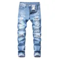 High-quality detail of men's light blue slim fit ripped straight leg denim jeans - 28 / Bottoms / Light Blue