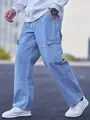 Side view of men's denim cargo pants showing the pocket and drawstring detail - S / Bottoms / Light Blue