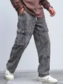 Close-up of men's grey acid wash cargo pants featuring functional side pockets and straight fit - S / Bottoms / Gray