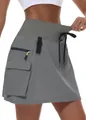 Close-up view of grey women's hiking cargo skirt with elastic waist and pocket details - XS / Bottoms / Gray