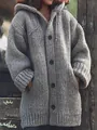 Détail d'un cardigan gris en maille épaisse à capucha avec des boutons noirs - S / Hauts / Gris