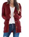 Close-up of a women's burgundy cable-knit long cardigan with buttons and pockets. - Burgundy
