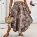 Womens bohemian ethnic print maxi skirt featuring high waist A-line silhouette and vintage pattern - Burgundy Ethnic Print