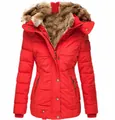 Detail view of a bright red slim-fit winter jacket for women featuring a cozy faux fur hood - S / Tops / Red